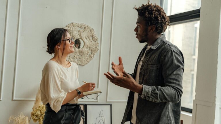 two people talking on couch