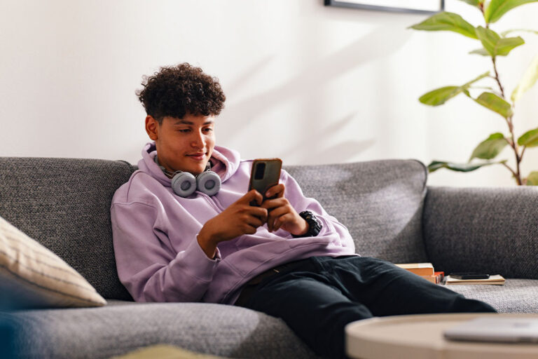 A person looking at a mental health app on their phone