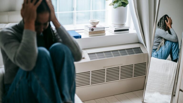 Military member speaks to a therapist.