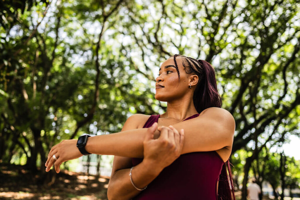 A person stretching outside.